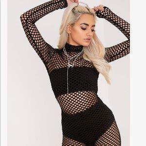 New with tags black fishnet unitard, size 4 (sm)